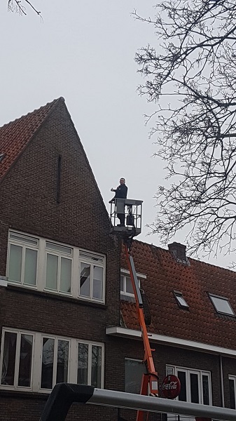  stormschade dak Huizen